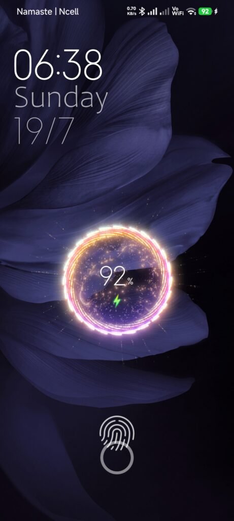 Lock screen showing a circular charging effect at 92% above the fingerprint graphic.